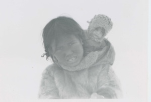 Image of Tark-to, Eskimo girl with doll
